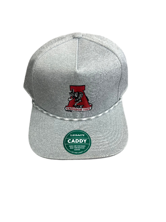 A person wearing a light blue long-sleeved shirt and beige pants is adjusting a white rope hat with an Alabama logo.