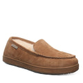 Brown slipper with brand label on a white background