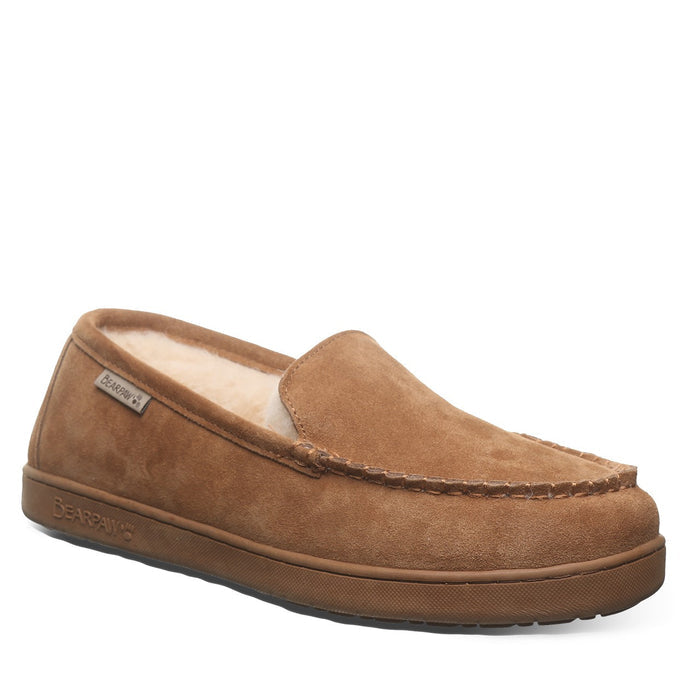 Brown slipper with brand label on a white background