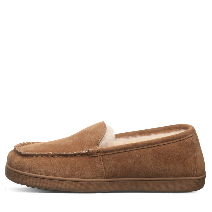 Brown slipper with brand label on a white background