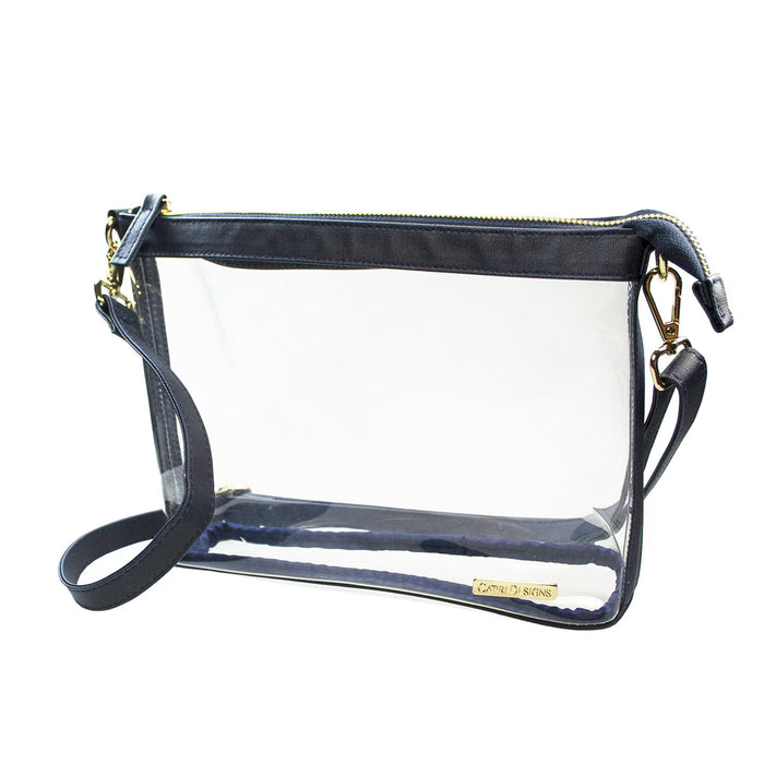 A clear plastic pouch bag with a navy blue faux-leather trim, gold-tone hardware, and a matching navy blue shoulder strap, shown on a plain white background.