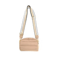 Beige handbag with a strap on a white background