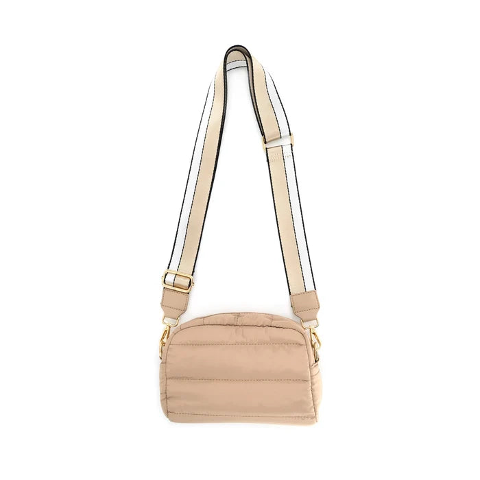 Beige handbag with a strap on a white background