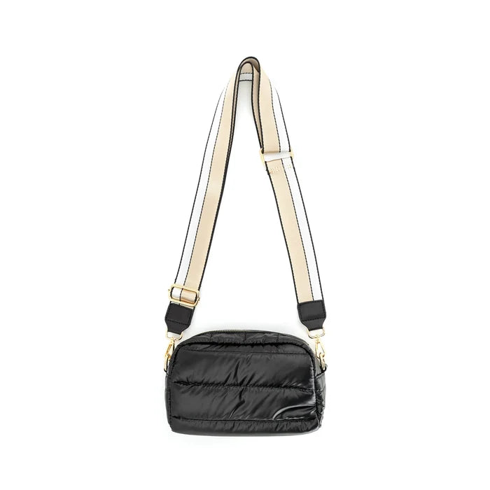 A black nylon crossbody puffer bag with a removable strap and gold-tone hardware.