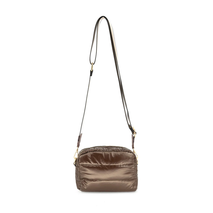 Brown crossbody bag with a strap on a white background