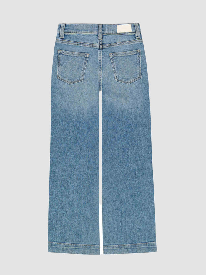 Blue jeans on a light gray background