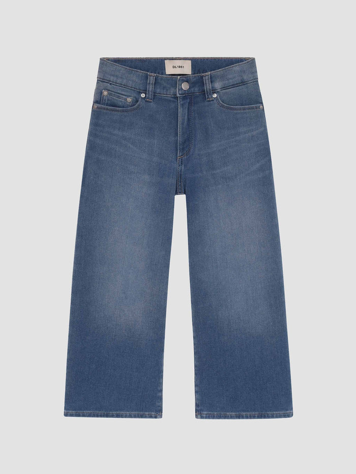 Blue jeans on a light gray background