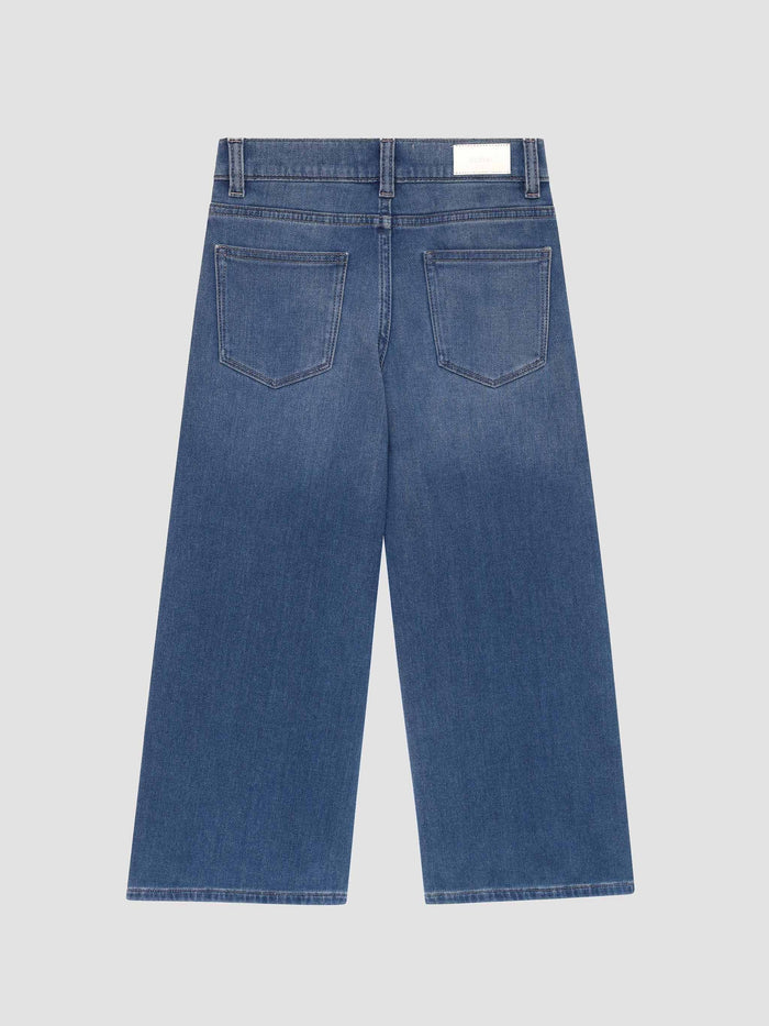 Blue jeans on a light gray background
