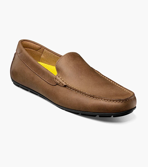 A brown Florsheim Motor Venetian loafer with a smooth leather upper and a rubber outsole.