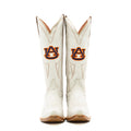 A pair of white women's western boots with embroidered team logos and a wood heel, designed for gameday attire.