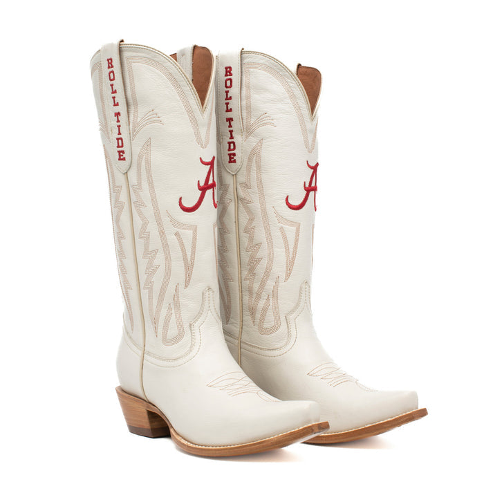 A pair of white women's western boots with embroidered team logos and a wood heel, designed for gameday attire.