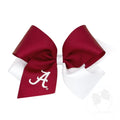 Red and white hair bow with a logo on a white background