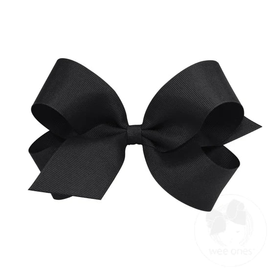 A large black grosgrain ribbon hair bow attached to a clip.
