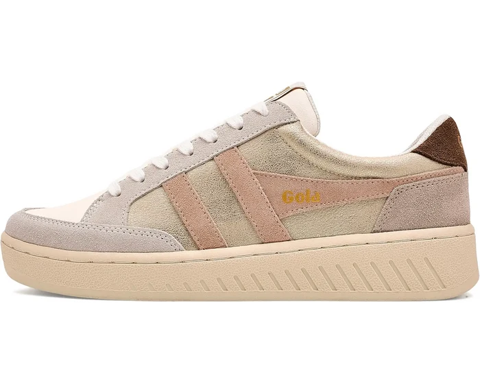 A low-top platform sneaker in beige, taupe, and light brown suede, featuring a thick cream platform sole, white laces, and a gold 'Gola' logo on the side.