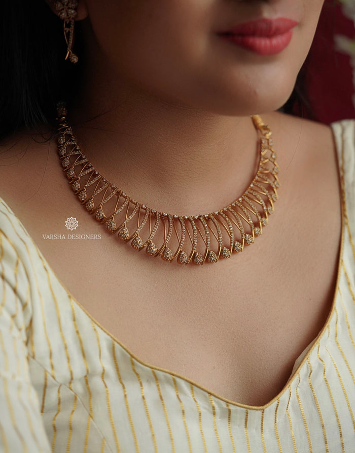 Gold Finish Designer White Stone Necklace