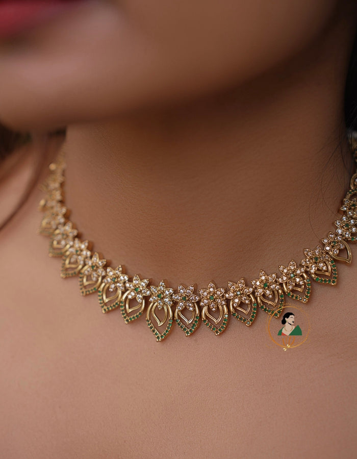 Gold Finish Green and White Stone Necklace