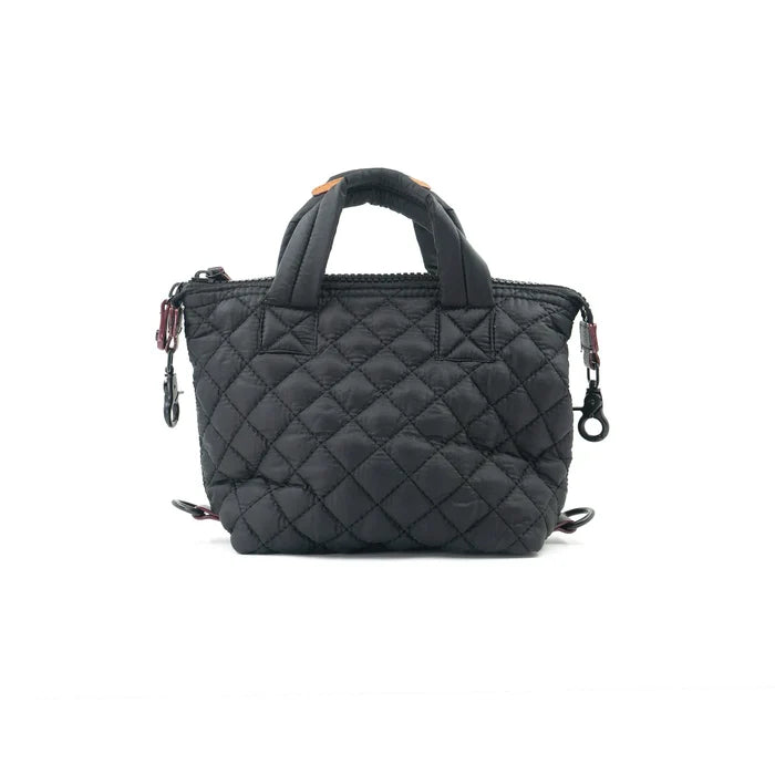A black quilted nylon crossbody bag with a detachable strap and a zipper closure.