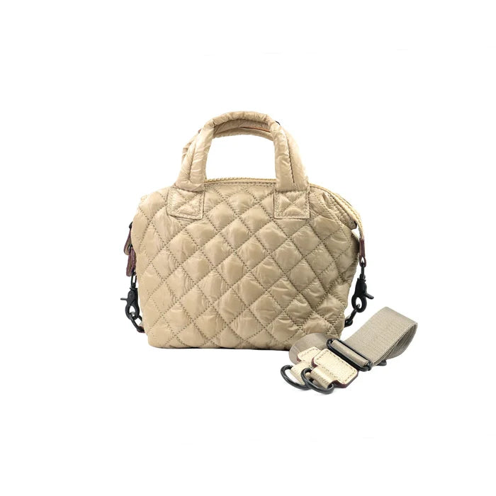 A beige quilted nylon crossbody bag with a detachable strap and a zipper closure.