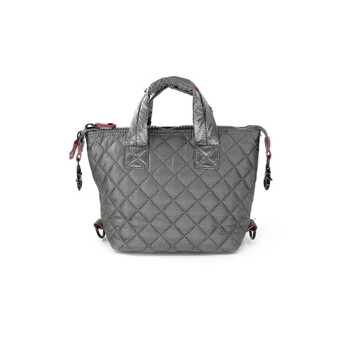 A pewter quilted nylon crossbody bag with a detachable strap and a zipper closure.
