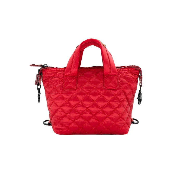 A red quilted nylon crossbody bag with a detachable strap and a zipper closure.
