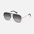 Sunglasses with black frames and gradient lenses on a white background