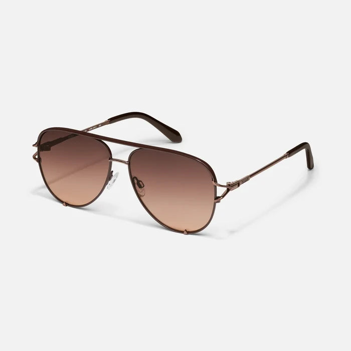 A pair of aviator-style sunglasses with a two-tone black and gold frame, gradient lenses, and textured metal arms.