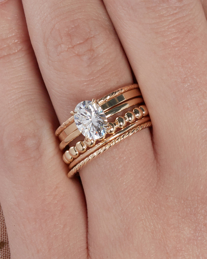 The Classique Metal Band- 1.5mm is the band right above the engagement ring