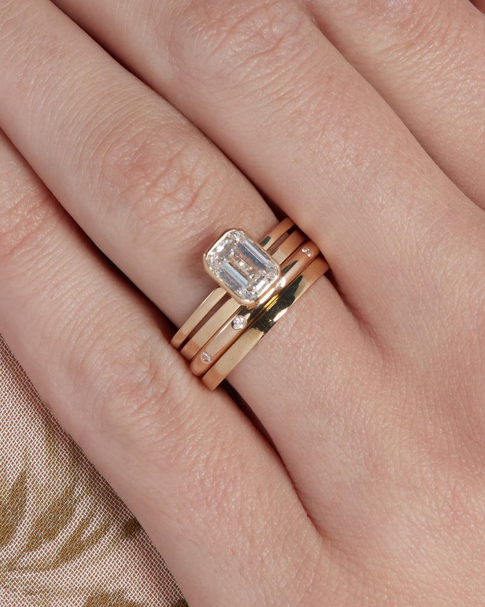 The Classique Metal Band- 1.5mm is the first band underneath the engagement ring