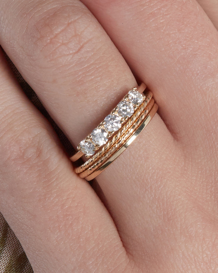 The Petite Etched Band is the second to last band on the bottom of the stack