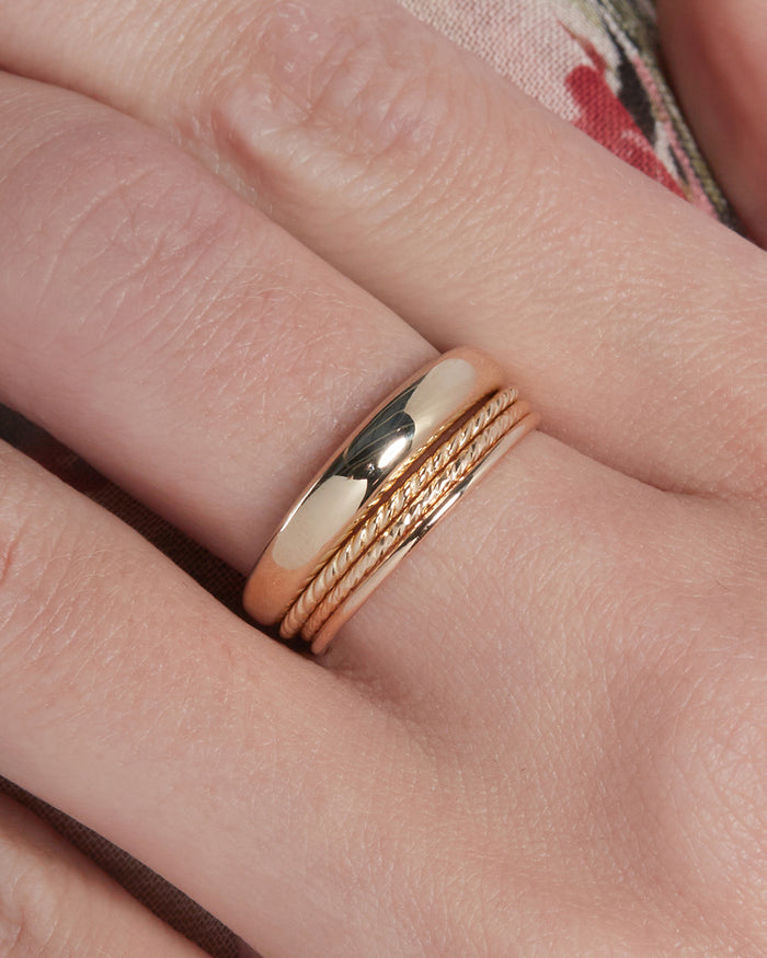 The Petite Etched Band is the second to last band on the bottom of the stack