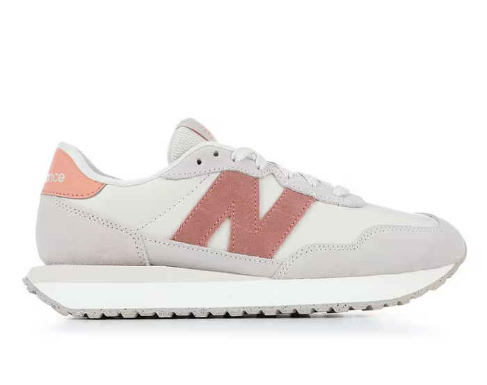 new balance sneaker with pink accents