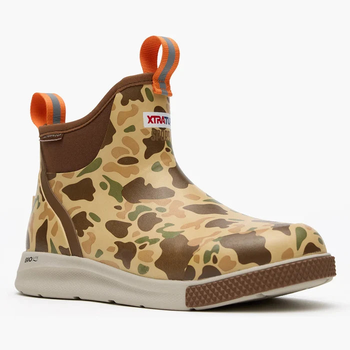 Camouflage-patterned boot with orange pull handles on a white background