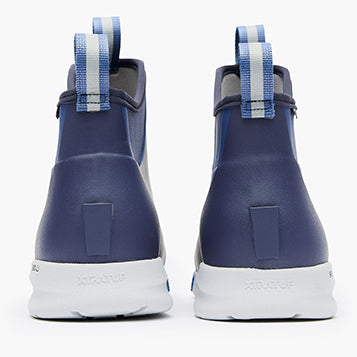 A pair of XtraTuf 6' ADB Sport M Boots for men, featuring a non-marking outsole, pull-on tabs, and a slip-resistant design in blue and black color.