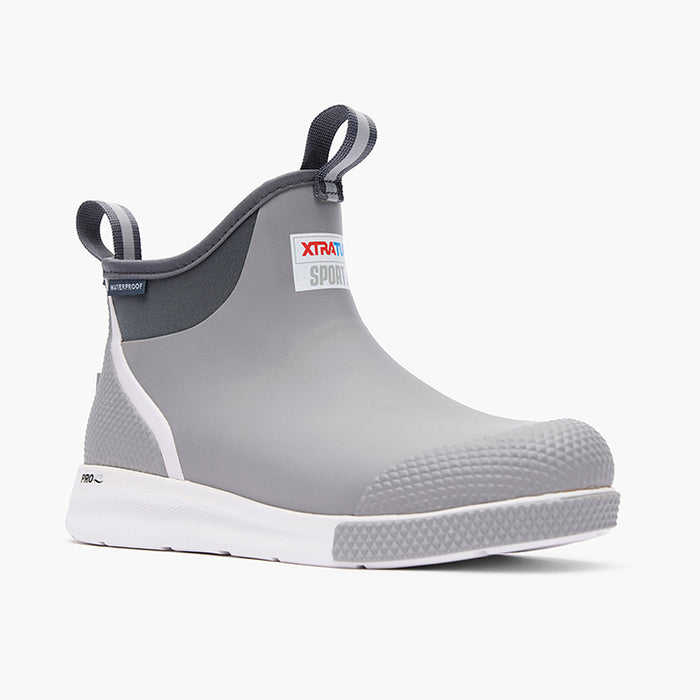 A pair of XtraTuf 6' ADB Sport M Boots for men, featuring a non-marking outsole, pull-on tabs, and a slip-resistant design in a grey color