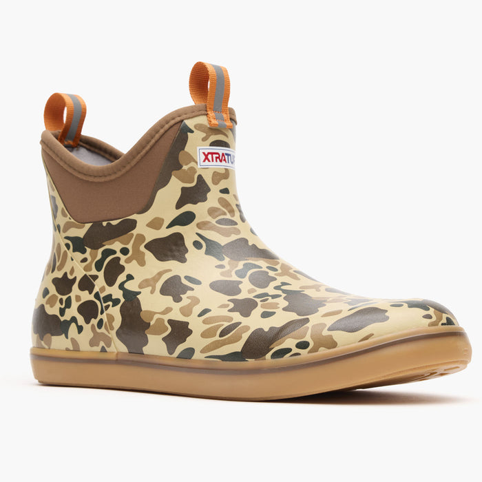 Camouflage-patterned rain boot with Xtratuf logo on a white background