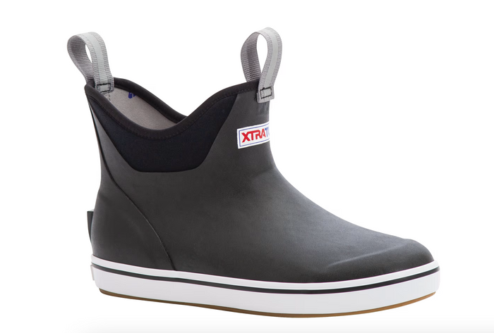 black rubber boot with white sole on a white background